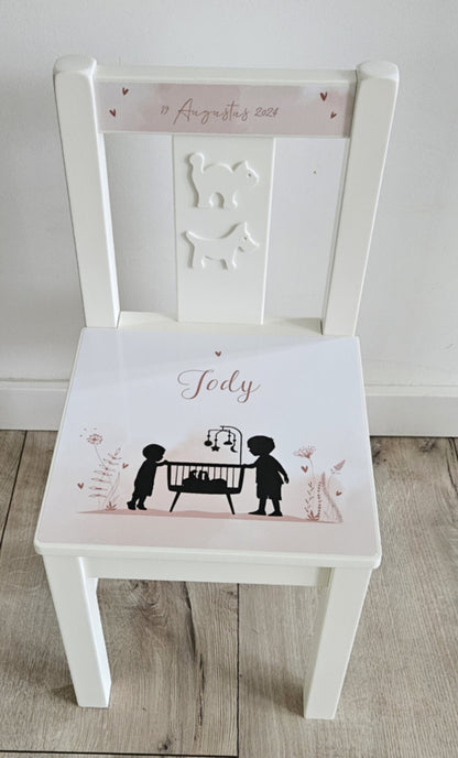 Geboortestoeltje met geboortekaartje