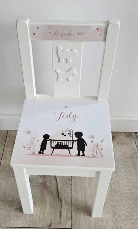 Geboortestoeltje met geboortekaartje