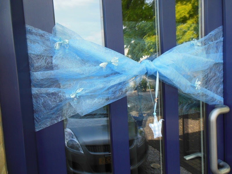 Blauwe deurstrik geboorte jongen